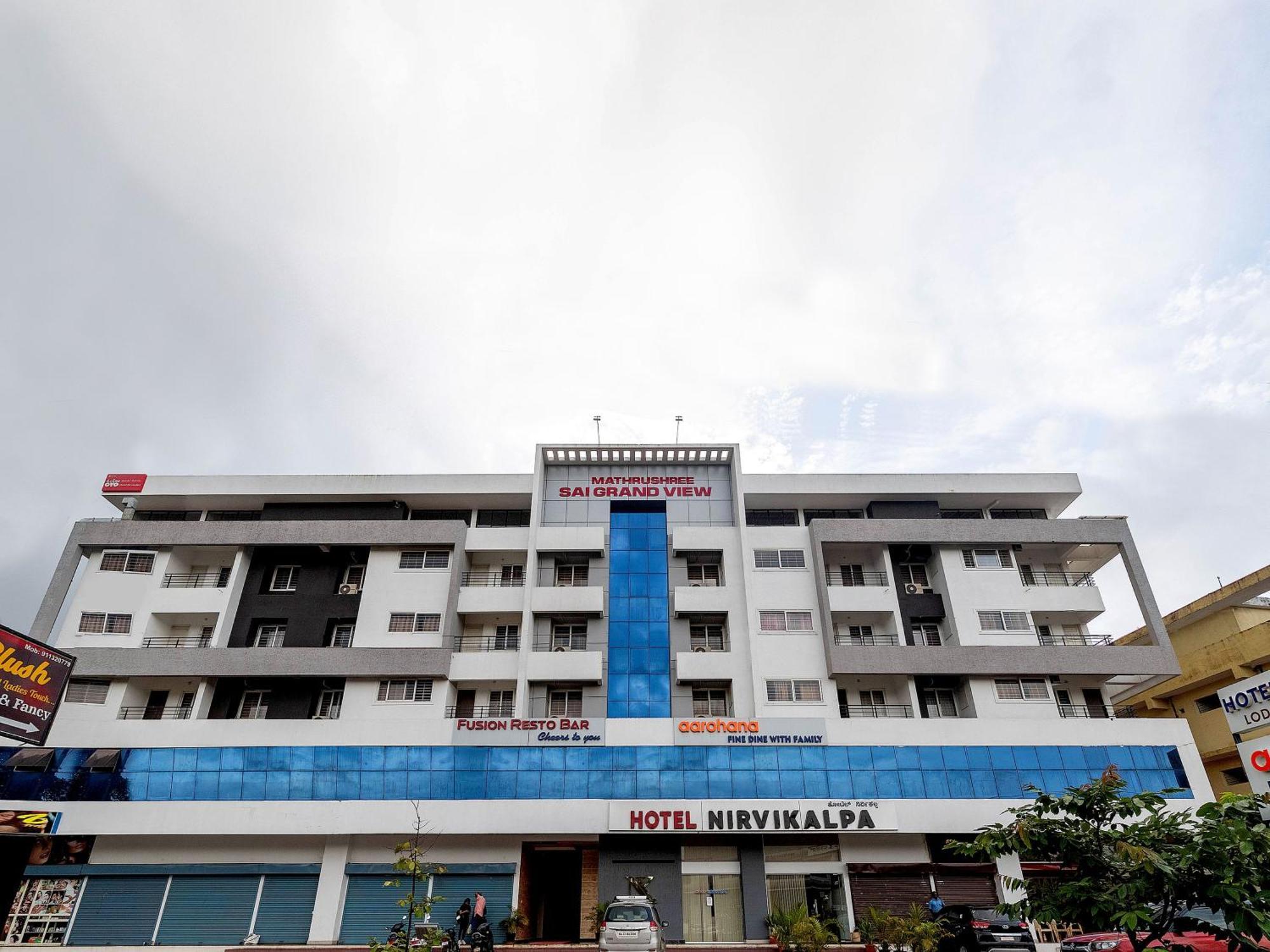 Hotel Super Collection O Nirvikalpa Ullāl Exterior foto